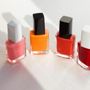 a group of different colored lipsticks